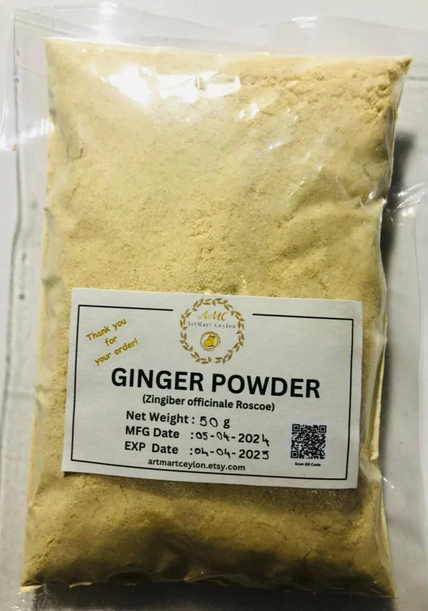 Hand stirring a spoonful of ginger powder into a warm mug of herbal tea or a healthy smoothie.