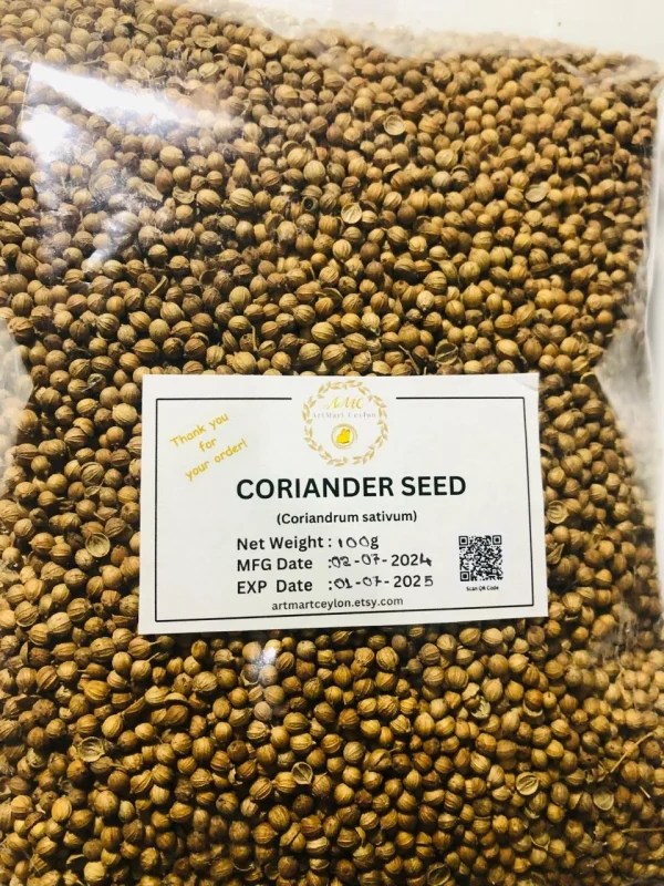 Close-up of light brown, round whole coriander seeds, showing their ribbed texture and consistent size.
