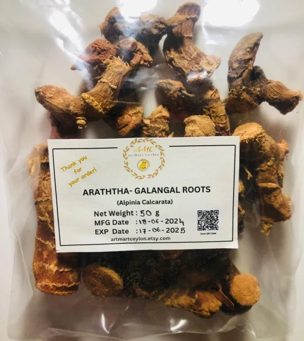 Dried Araththa Root pieces simmering in water in a traditional pot or a glass, preparing a herbal decoction.