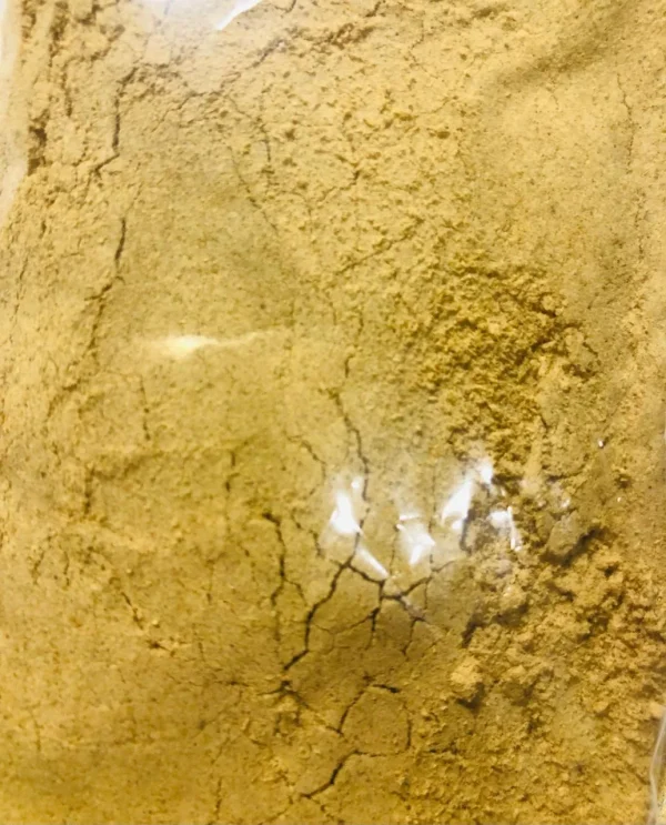 Branded, clearly labeled bag of 100% pure Bulu Powder (Beleric Myrobalan), indicating organic sourcing from Sri Lanka.
