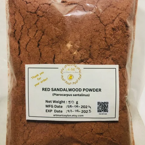 Close-up of finely ground, deep red Red Sandalwood Powder, showcasing its rich color and smooth texture.