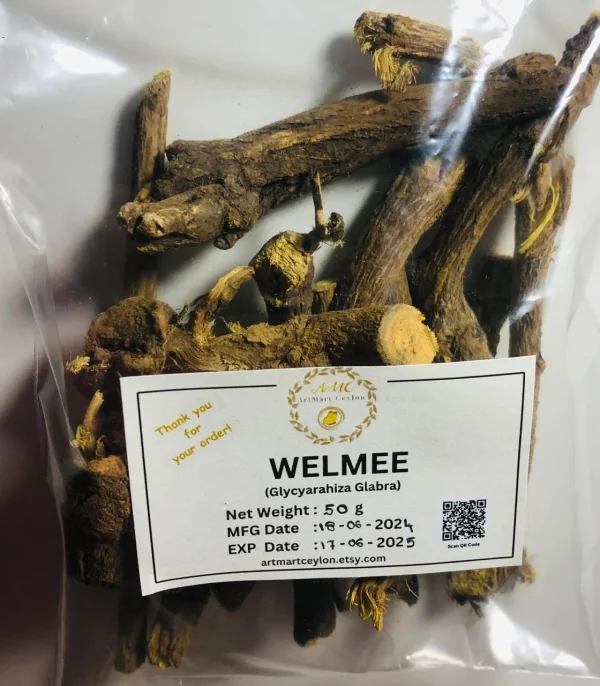 Dried Walmee (Licorice) root pieces steeping in hot water in a glass or traditional teapot, creating a light, sweet herbal infusion.
