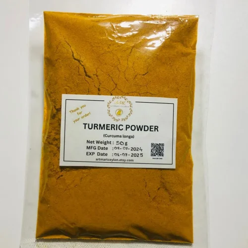 Close-up of vibrant yellow-orange, finely ground turmeric powder, showing its consistent texture.