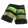 A pile of whole, dried bay leaves on a rustic wooden surface, highlighting their natural and aromatic quality for cooking.
